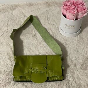 Brand New bought in London. Unique Hand made leather hand bag. 8L x 5H x .5w